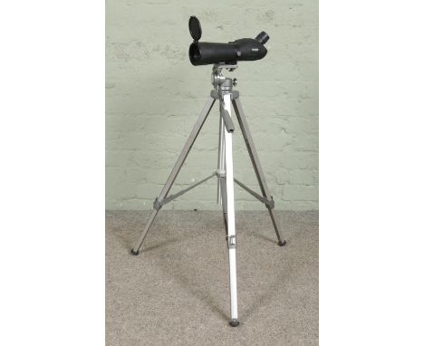 A Zennok 20-60x60 sight scope, mounted on Velbon CPH-S  telescopic tripod stand.