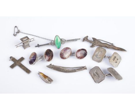 A collection of silver and white metal jewellery and accessories. To include a pair of blue john mounted cufflinks, kukri swo