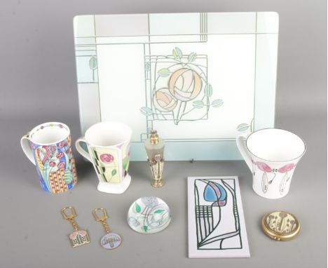 A quantity of Charles Rennie Mackintosh inspired collectables to include Mynde Ceramic tile, Sutherland mug, placemat, keyrin