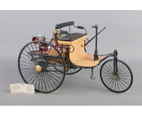 A Franklin Mint Precision Model of the 1886 Mercedes Patent Motorwagen, 1:8 scale.