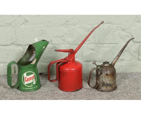 Three vintage oil cans, including an example from Castrol.