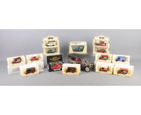 A collection of scale model vehicles, to include Waco battery operated, Matchbox Models of Yesteryear and Lledo Days Gone.