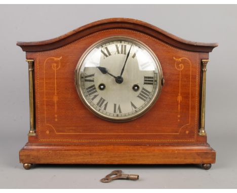 An early 20th century inlay mantel column clock, with Roman numeral dial, size W33 x D13 x H26cm.  Running.