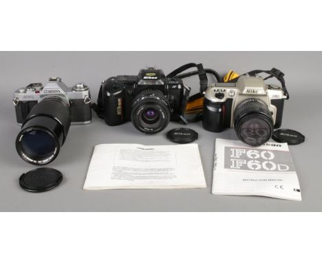 Three film cameras: Nikon F-401 with Nikkor 35-70mm f3.3-4.5, Nikon F60 with Nikkor 35-80mm f4-5.6 and Canon AV-1 with Canon 