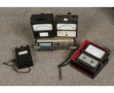A Hitachi V-422 portable dual-channel oscilloscope along with a collection of electrical measuring instruments such as an Eag