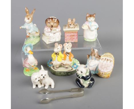 A collection of mostly Beswick ceramic figures to include six Frederick Warne and Co. Beatrix Potter characters, Kitty Macbri
