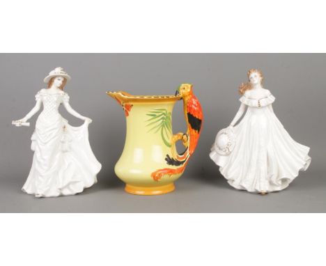 A 1930s Burleigh Ware parrot handle jug (H20cm) with two 1996 Royal Worcester Golden Moments lady figurines "Friendship" (H23