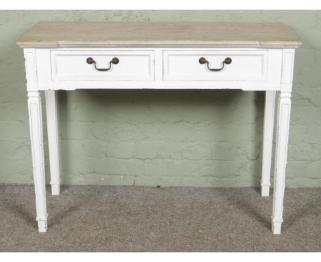 A white painted modern console tableHx81cmWx103cmDx40cm