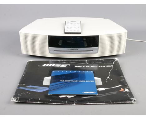 A Bose Wave CD/Radio system, with remote.  Does not power up, may just require new battery.