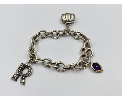 .925 silver charm bracelet. Weight 36g. Shipping Group (A). 