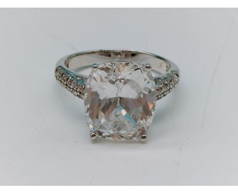 .925 silver and cubic zirconia set ring. Size O. Shipping Group (A). 