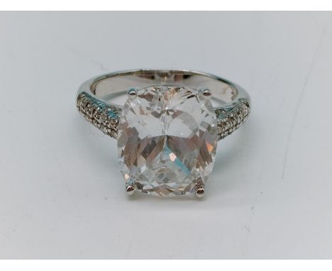 .925 silver and cubic zirconia set ring. Size O. Shipping Group (A). 