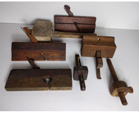 Vintage hand tools including wooden mallet, plough and 3 moulding planes, 1 single and 1 double marking gauges and a sliding 