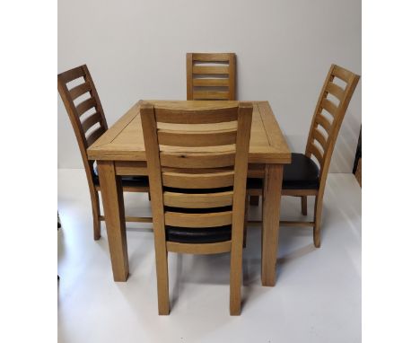 Light oak dining table and (4) ladder-back chairs. Table 80 x 90 cm extending to 180 cm. Collection only. 