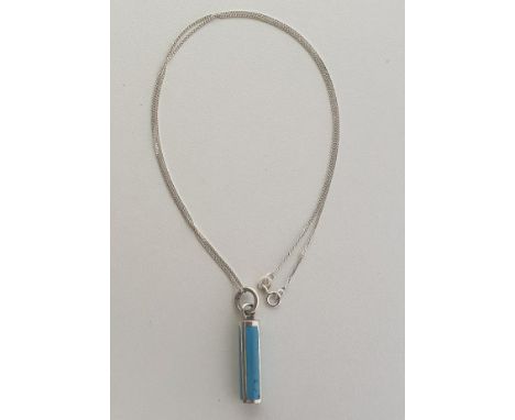 (2) .925 silver and turquoise pendants on chains. Shipping Group (A). 