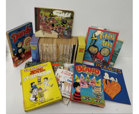 Quantity of vintage annuals including Beano, Dandy, Giles etc. Shipping Group (A). 