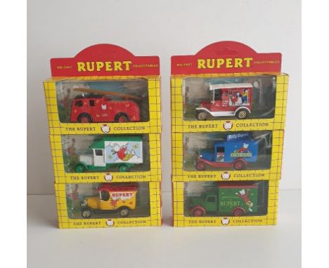 (6) Die cast Rupert collection model vehicles Shipping Group (A). 