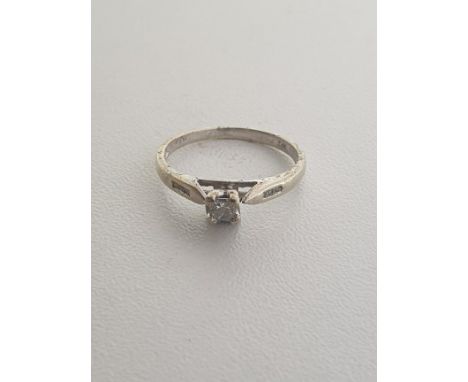 White gold diamond set ring featuring diamond set shank. Total weight: 1.3g size K Shipping Group (A). 