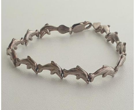 .925 silver dolphin design link bracelet. Shipping Group (A). 