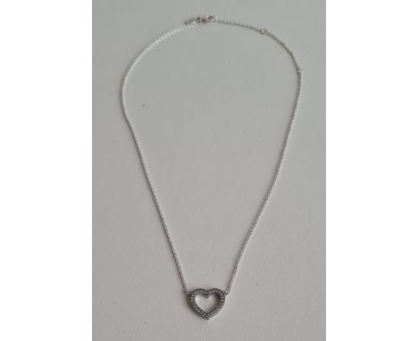 Pandora .925 silver and cubic zirconia open heart pendant on chain. Shipping Group (A). 