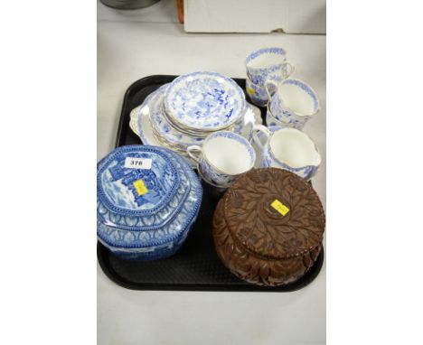 A Maling Ringtons blue and white biscuit jar and cover; a carved wooden biscuit jar and cover; and Royal Albert blue and whit