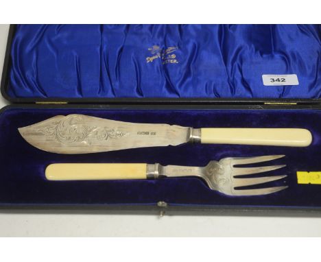 A fish serving knife and fork set, by Harrison Brothers &amp; Howson, Sheffield 1904, the silver blade and time with engraved