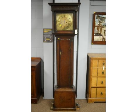 E Foster - An 18th Century longcase clock, the square brass dial with roman hours and arabic minutes and striking a bell, con