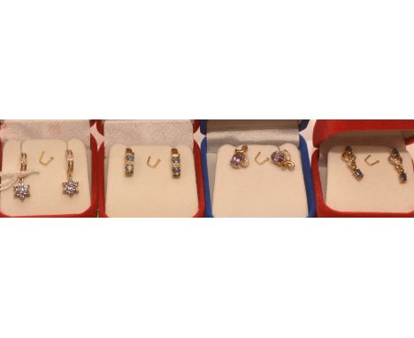 Four pairs of gems set earrings, to include: a pair of tanzanite and diamond set earrings in 9ct yellow gold; a pair of ameth