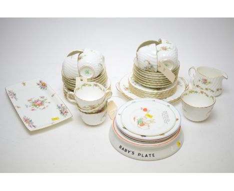 A part Minton's floral printed tea service, comprising: teacups, saucers, plates, sandwich plate, etc; together with a Shelle