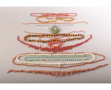 A MIXED LOT OF VARIOUS BEADED NECKLACES, comprising of jadeite, coral and amber, also including a jade or jadeite pendant wit