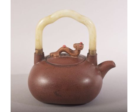 A CHINESE YIXING CLAY JADE HANDLE TEAPOT - the handle with a ruyi model with inset stones- the base with an impressed mark, 1