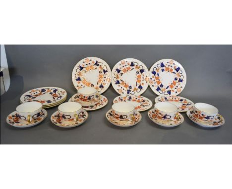 A Royal Crown Derby Tea Service comprising of six cups and saucers, six plates and three side plates all decorated in the Ima