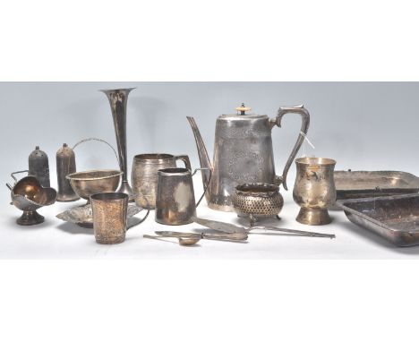 A mixed group of vintage silver plate wares dating from the early 20th Century to include large milk jug, swing handle basket