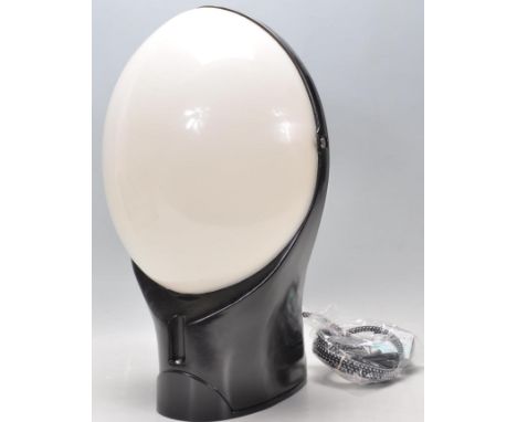 A mid 20th Century Art Deco style wall light converted into a table lamp having an opaline perspex diffuser in two halves for