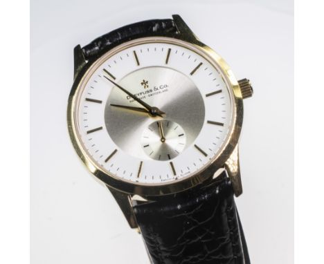 A GOLD PLATED DREYFUSS &amp; CO WATCH. Circular silver and white dial with gilt baton index and seconds dial at 6 o'clock, ca