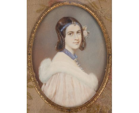 A well painted miniature portrait of a young lady wearing a fur collared cape, fabric mount and gold painted wood frame&nbsp;