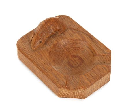 Workshop of Robert "Mouseman" Thompson of Kilburn, an oak ash tray with trademark carved mouse, 10.5cm long