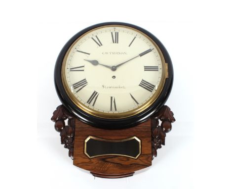 A 19th Century rosewood cased wall clock, having carved foliate decoration, circular white enamel Roman numeral dial by G.W. 