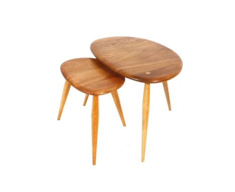 An Ercol nest of two "Pebble" coffee tables