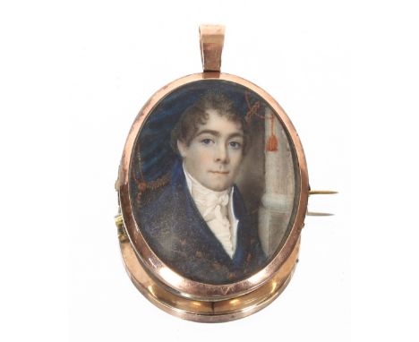 A fine 19th Century miniature portrait of a gentleman, the obverse with finely platted hair and seed pearls, set in a yellow 