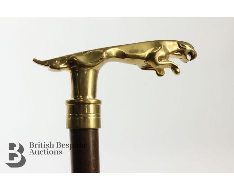 Brass leaping jaguar walking stick, approx 90 cms.&nbsp;