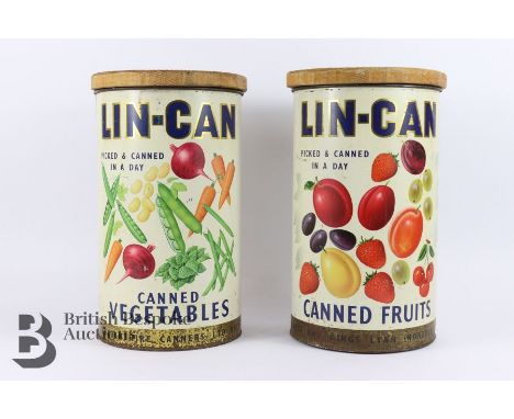 Two vintage storage tins, colourful exterior, depicting vegetables and fruit, approx 39 cms each.&nbsp;