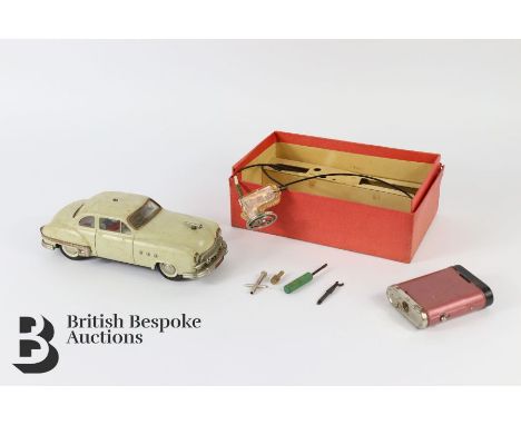 Schuco Electro Ingenico 5380 4.5 volt model car, complete with the original tools, battery pack and steering device, boxed.