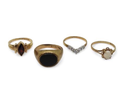 Four 9ct gold rings, onyx signet ring size P, cz 'V' shaped ring size N1/2, opal ring size M1/2, and garnet ring M, weight to