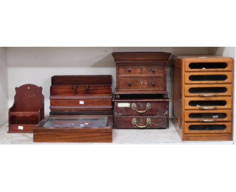 A mixed lot to include oak haberdashers style drawers with glazed drawer facings, oak two drawer cash drawer, small two drawe