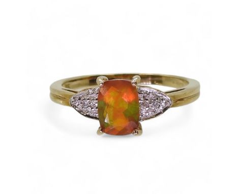 A 9ct gold Rocks &amp; Co fire opal and diamond ring, size N1/2, weight 2.1gms Condition Report:Available upon request