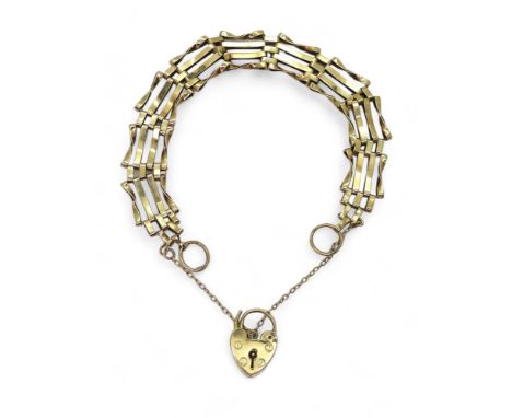 A 9ct gold gate bracelet with heart shaped clasp, weight 9.6gms Condition Report:Available upon request