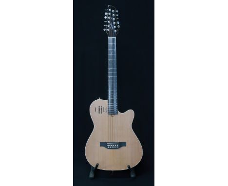 A Godin A12 electro acoustic 12 string guitar serial number 20154152 with a Godin gig bag. This Canadian 22 fret handmade gui