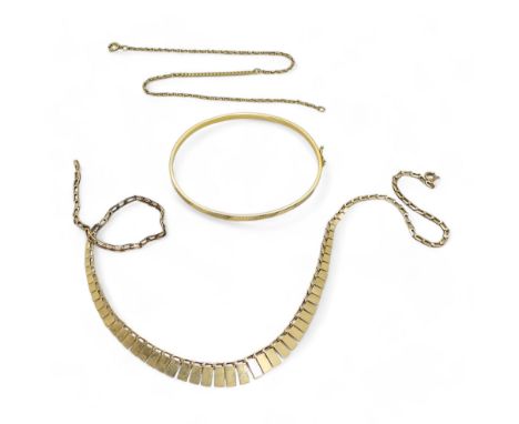 A 9ct gold bangle, 40cm fringe necklace, and a yellow metal chain bracelet, weight 9.8gms Condition Report:Available upon req