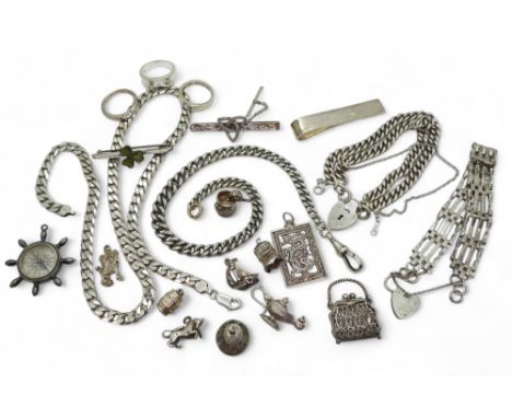 A collection of silver and white metal to include curb chain bracelets and a necklace, gate bracelet, tie slides, charms ring